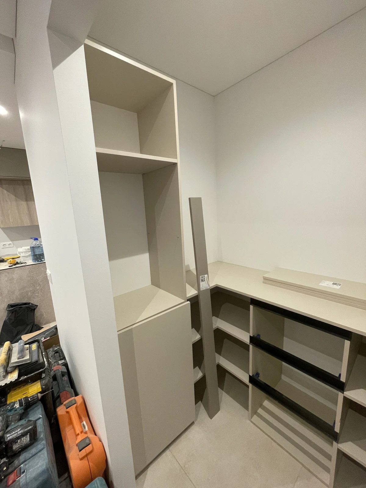 Bespoke storage with drawers and shelves during the fit-out.