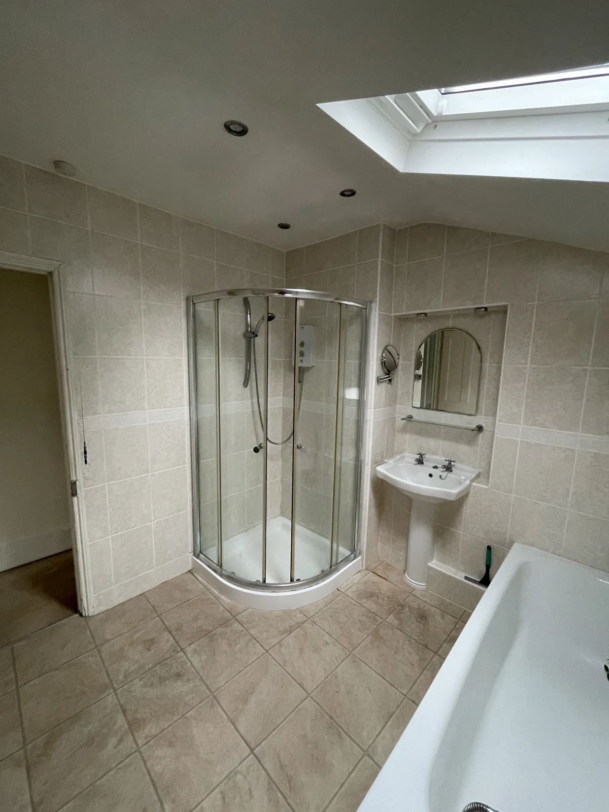 The original Charlton bathroom, with a separate shower enclosure, bath and pedestal basin