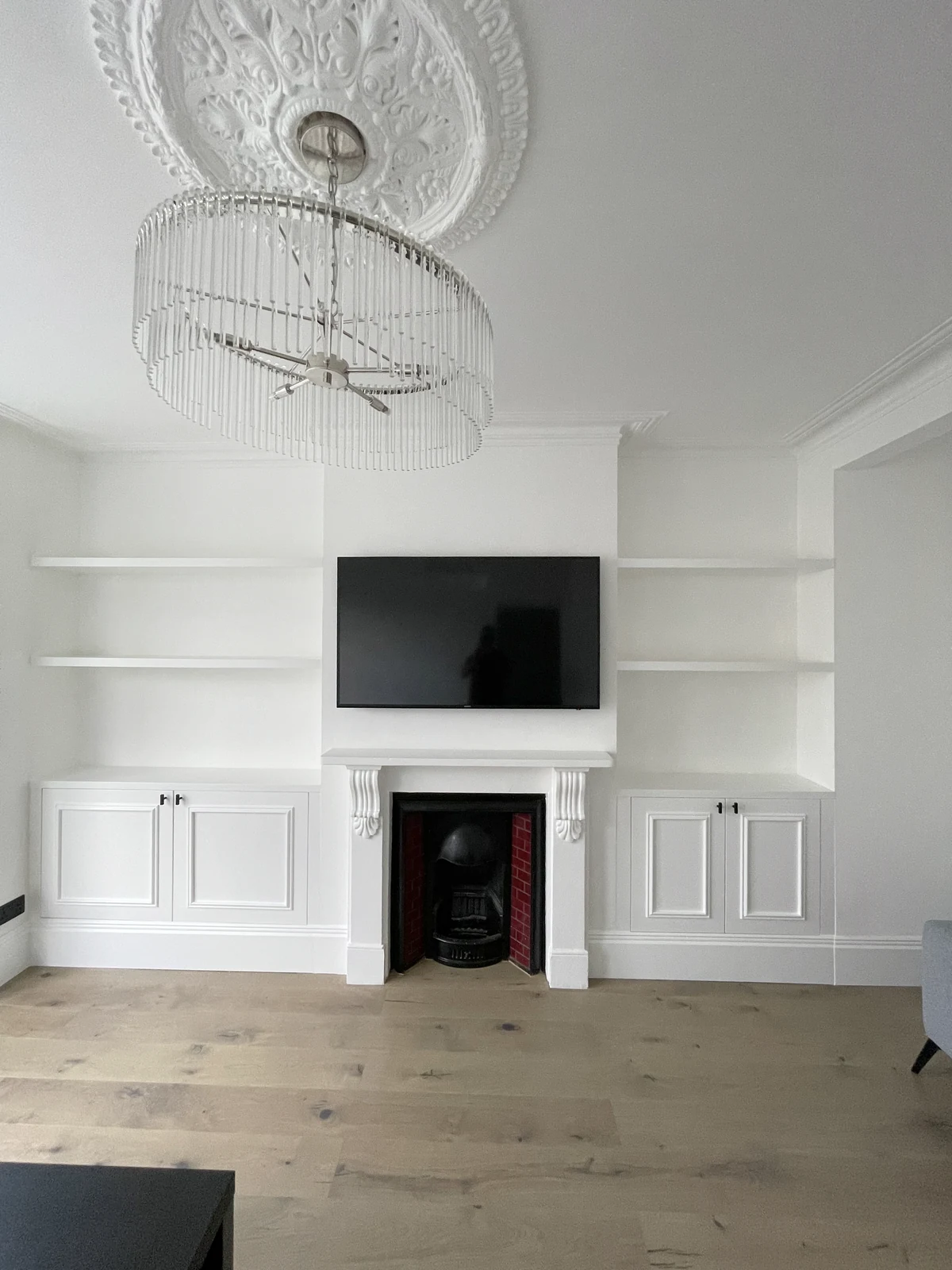 Finished living-room cabinetry around the fireplace