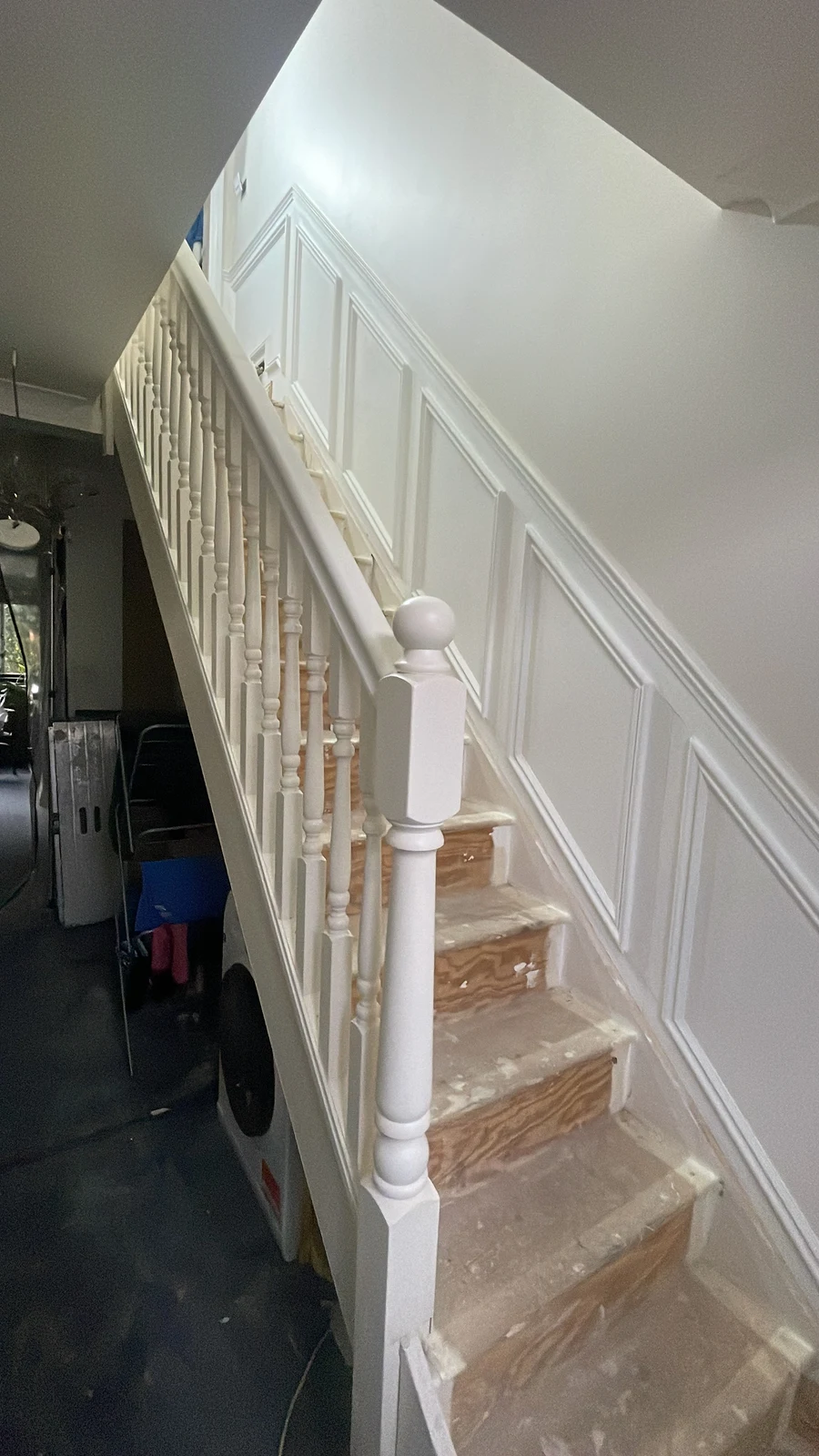 Decorative stair panelling painted before the timber treads were finished.