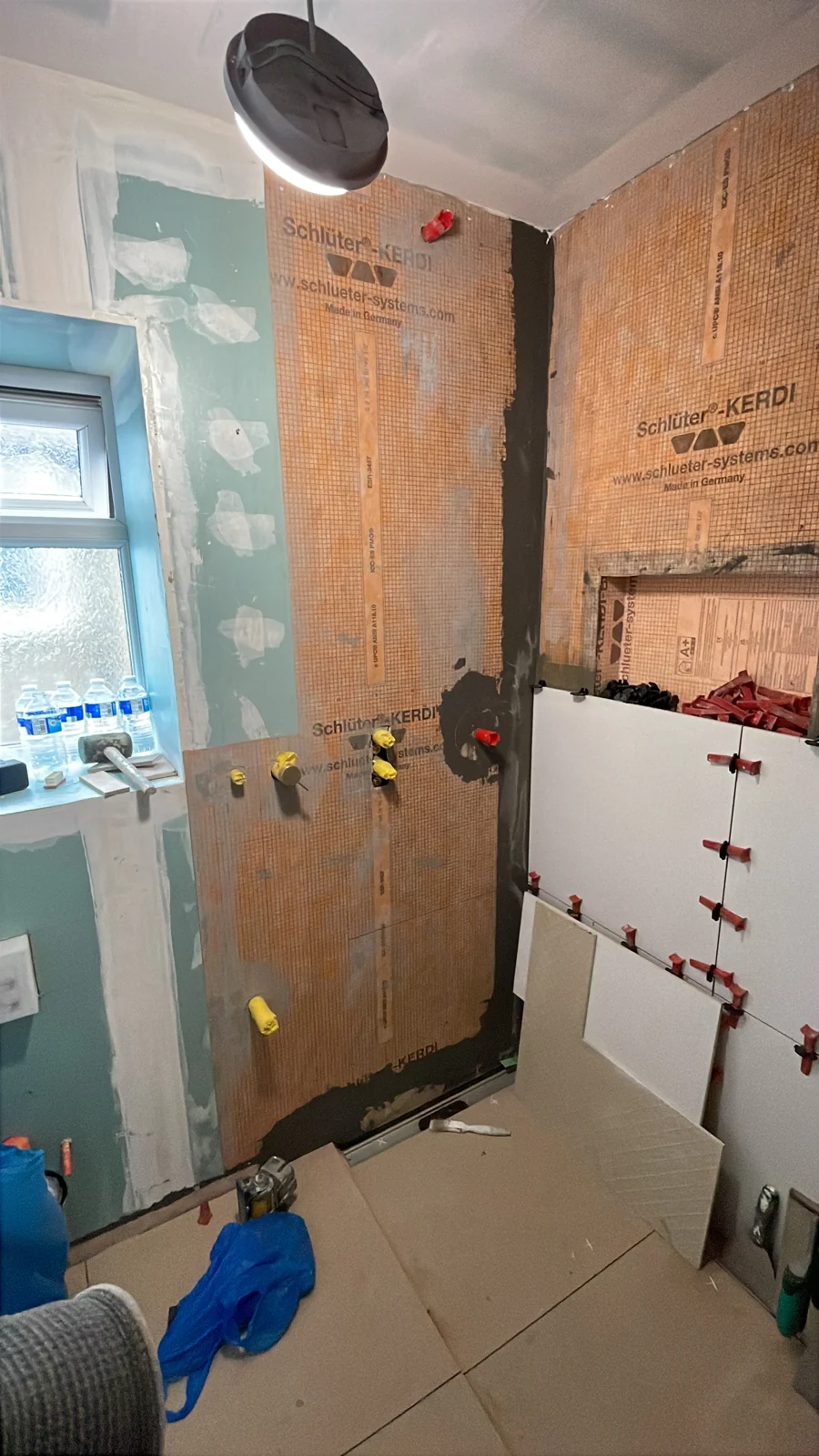 Shower waterproofing and tiling in progress